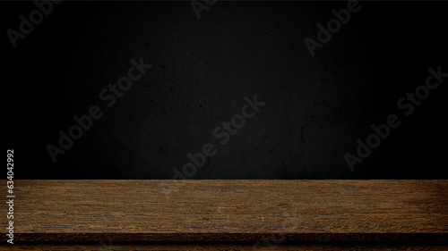 Empty wooden table on dark background