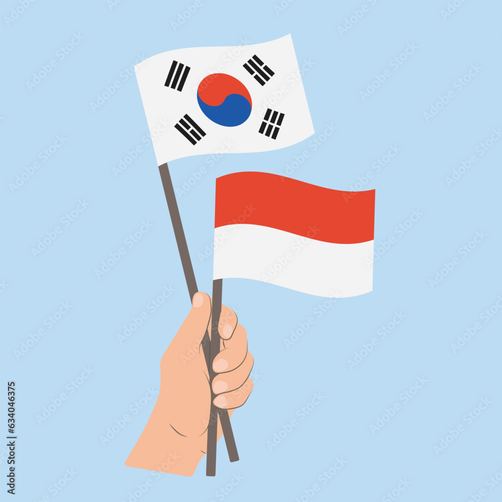 Flags of South Korea and Indonesia, Hand Holding flags Flags of South Korea and Indonesia, Hand Holding flags