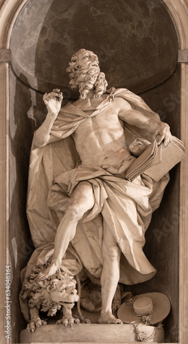 GENOVA, ITALY - MARCH 7, 2023: The statue of St. Jerome in the church Basilica di Santa Maria Assunta by Diego Carlone (1740). photo