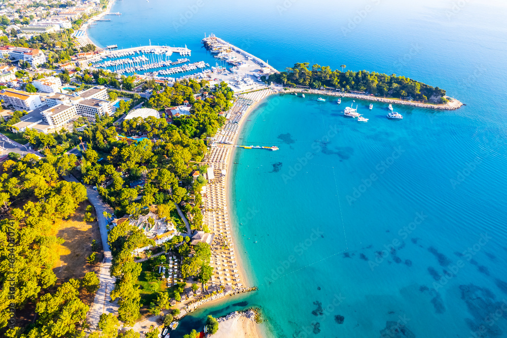 Fototapeta premium Kemer, Antalya, Turkey. Aerial view of Moonlight Beach in Kemer. Beautiful turquoise colors of Mediterranean sea. Drone shot.