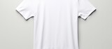 Front view of a blank white T shirt used as a design template and isolated on a white background