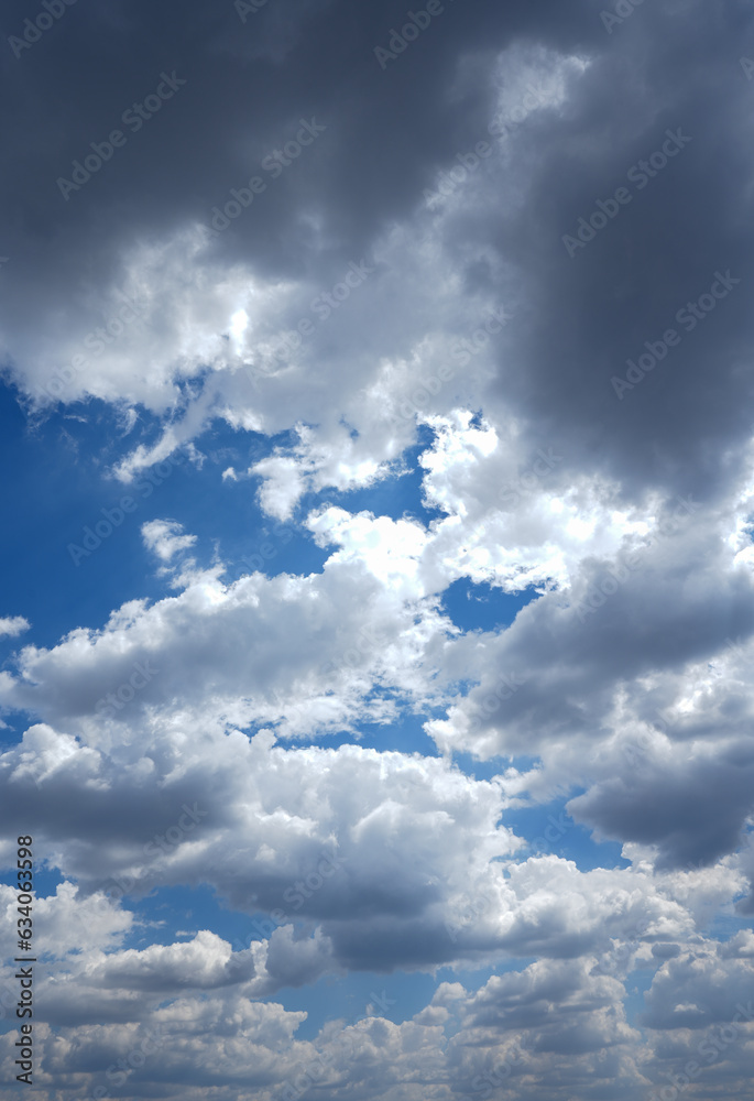 Obraz premium cloudy sky. white and fluffy clouds with a blue background.