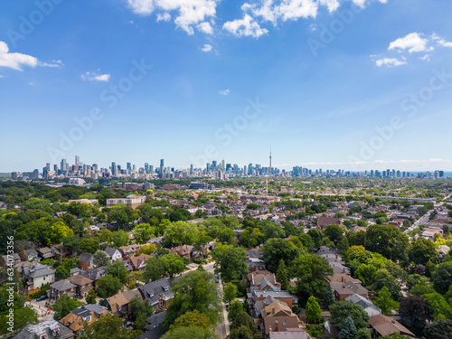Experience Downtown Toronto like never before with a mesmerizing drone view of its iconic skyline. Witness the architectural marvels and the city's pulsating energy from a bird's-eye perspective." © contentzilla