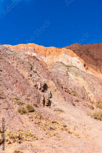 HILL OF SEVEN COLORS IN PURMAMARCA. HUMAHUACA, JUJUY. ARGENTINE NORTHWEST. FAMOUS TOURIST PLACE.