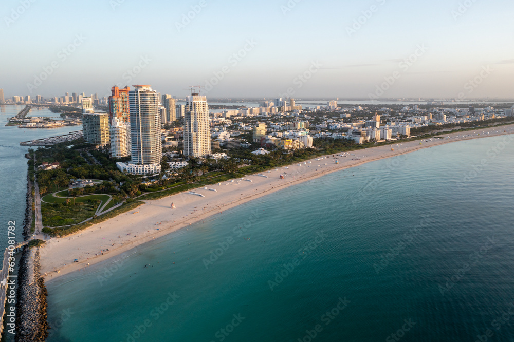 Aerial view of South Beach and South Pointe Park in Miami Beach, Florida at sunrise on calm clear summer morning.