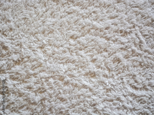 Illustration White knitted background machra. White patterned background. White terry fabric
