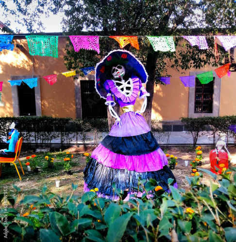  mexican catrina skeleton with purple dress traditional day of the dead culture halloween and colorful ornaments