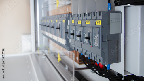 Photography Voltage switchboard with circuit breakers.