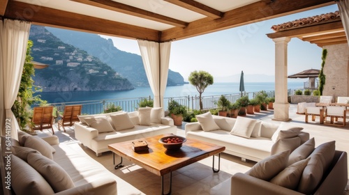 Majestic villa situated along the captivating Amalfi Coast of Italy, granting breathtaking views of the shimmering Mediterranean Sea and the intricate terraced cliffs © Damian Sobczyk