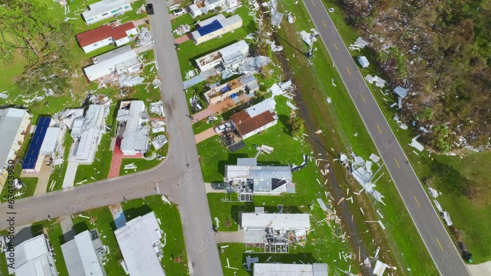 Severely damaged by hurricane Ian houses in Florida mobile home residential area. Consequences of natural disaster Severely damaged by hurricane Ian houses in Florida mobile home residential area. Consequences of natural disaster