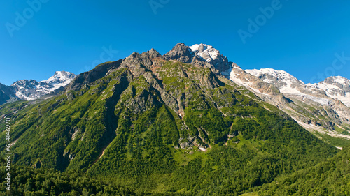 panorama of summer mountains with waterfalls