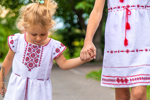 Children Ukrainians in vyshyvanka are patriots. Selective focus. photo