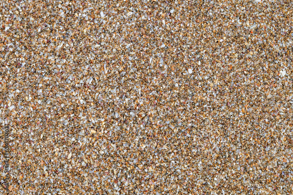 Yellow sand, grains of sand close-up, uniform texture background Yellow sand, grains of sand close-up, uniform texture background