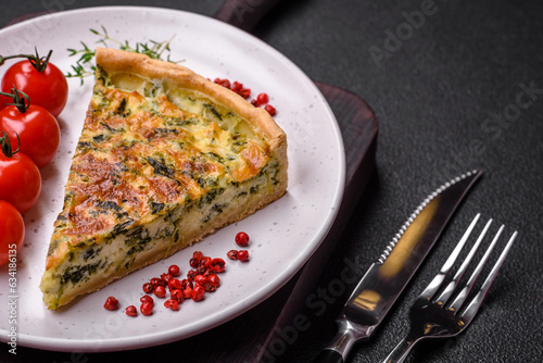Delicious fresh quiche with broccoli, cheese, spices and herbs cut into pieces