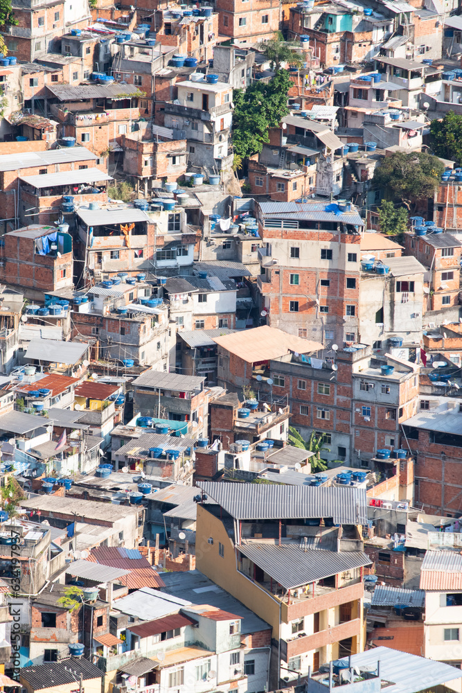 Brazil: skyline and detail view of Rocinha, the famous favela in the southern area of ​​Rio de Janeiro, the largest slum in the country between Gavea, Sao Conrado and Vidigal districts 