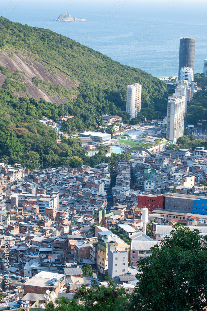 Brazil: the postcard skyline of Rio de Janeiro seen from Rocinha, the most famous favela of the city and the largest slum in the country between Gavea, Sao Conrado and Vidigal districts