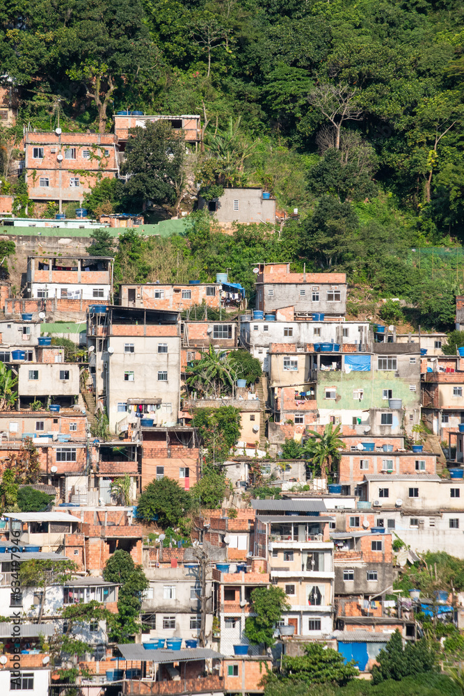 Brazil: skyline and detail view of Rocinha, the famous favela in the southern area of ​​Rio de Janeiro, the largest slum in the country between Gavea, Sao Conrado and Vidigal districts 