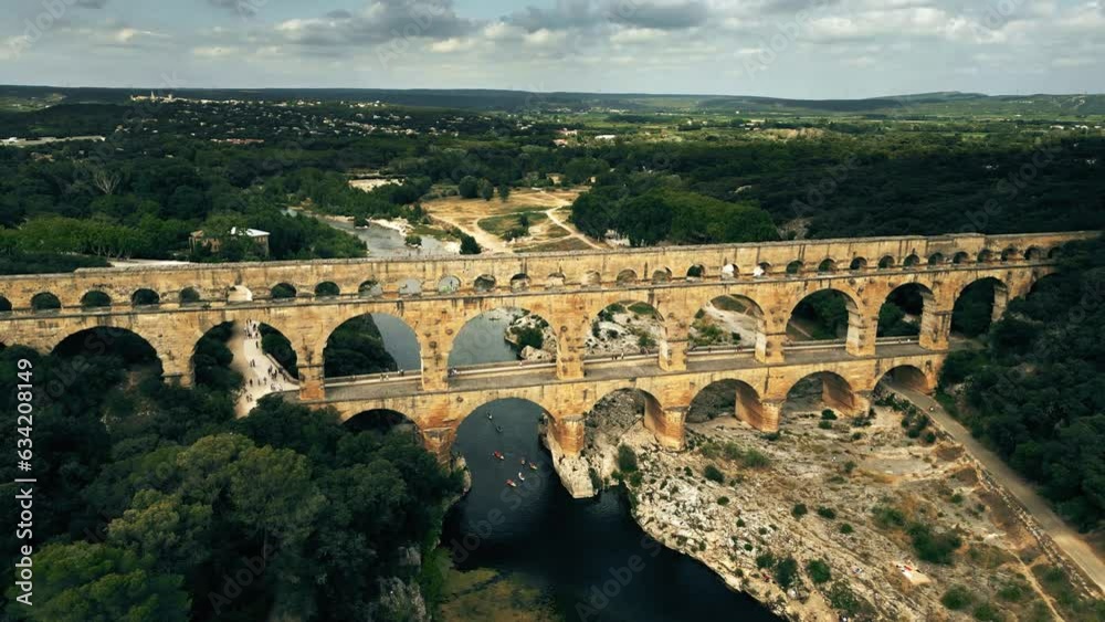 Aerial view of the Pont du Gard, the Roman aqueduct bridge of Nimes over the Gardon River in France Aerial view of the Pont du Gard, the Roman aqueduct bridge of Nimes over the Gardon River in France