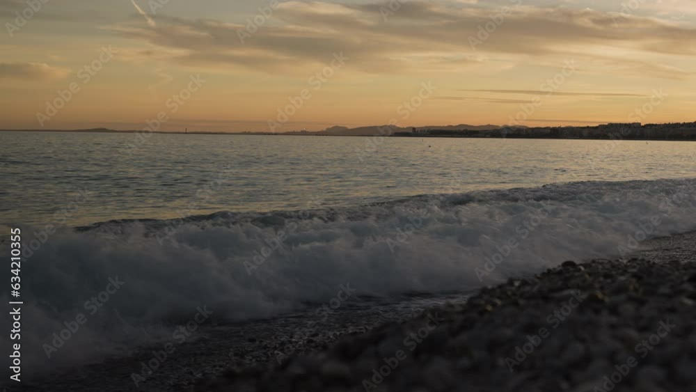 custom made wallpaper toronto digitalLow angle shot of sunset on a pebble beach of Nice