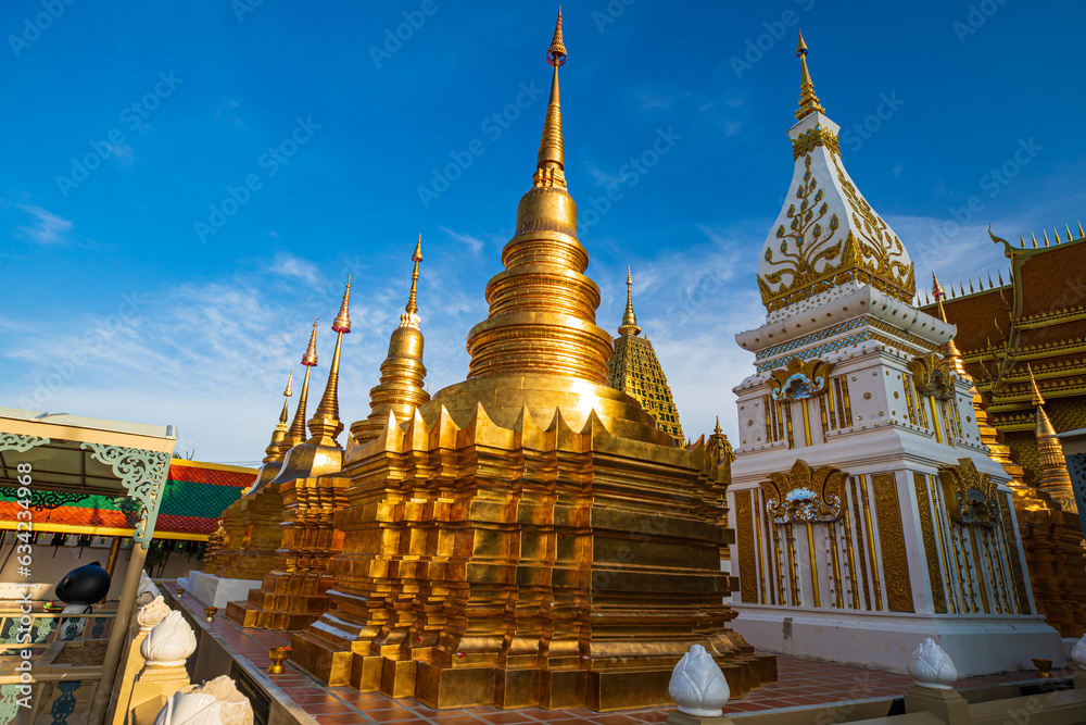 Naklejka premium Pagoda gold and church in wat thai reflect with sun sky in day time in Bangkok Thailand.