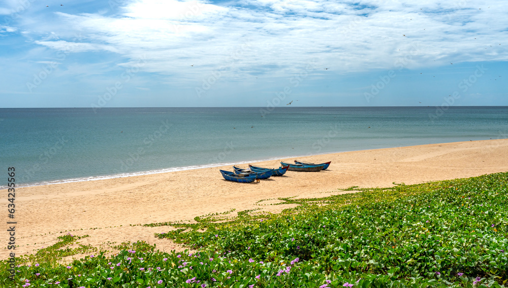 Small boats parked on the beach in Tuy Hoa city, Phu Yen province, Vietnam