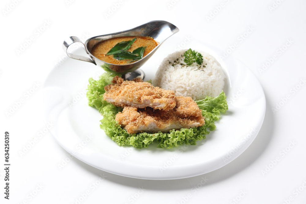 crispy deep fried chicken chop fish cutlet lettuce serve with nonya spicy malay curry leaf sauce and jasmine rice on grey cloth white background design asian chef cuisine halal food menu for cafe crispy deep fried chicken chop fish cutlet lettuce serve with nonya spicy malay curry leaf sauce and jasmine rice on grey cloth white background design asian chef cuisine halal food menu for cafe