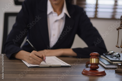 Justice and law concept. Law, legal judgement, courtroom gavel, African American attorney, lawyers discussing contract or business agreement at law firm office, Lawyer woman,