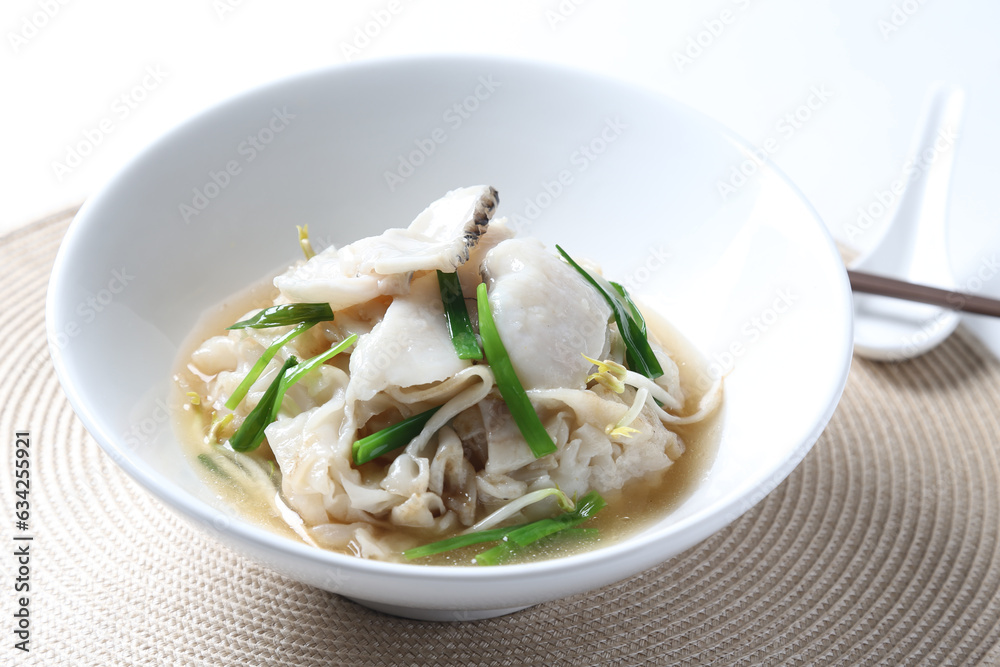 hot wok chinese fried kway teow vermicelli noodle with grouper fish slices and vegetables in thick gravy egg sauce in bowl on brown cloth white background asian chef cuisine halal food menu for cafe hot wok chinese fried kway teow vermicelli noodle with grouper fish slices and vegetables in thick gravy egg sauce in bowl on brown cloth white background asian chef cuisine halal food menu for cafe