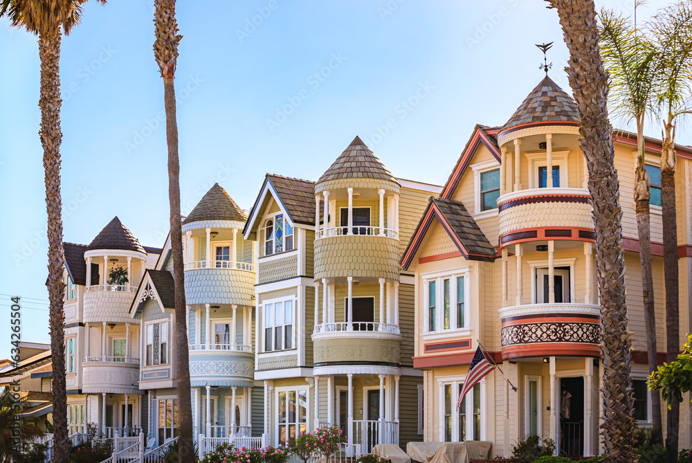 Naklejka premium Old Victorian houses on a street in Huntington Beach, Orange County, California