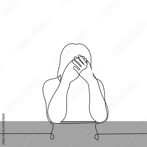 woman crying uncontrollably at the table - one line art vector. the concept to cry hopelessly, be afraid and cover your face in shame