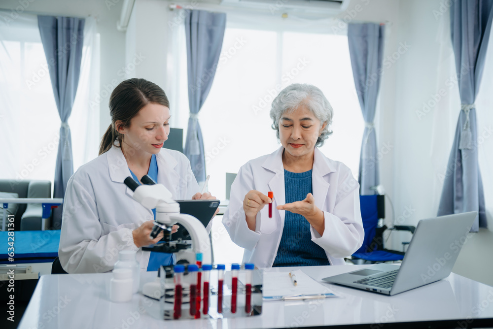 Medical team having a meeting with doctors. Young scientists conducting research investigations in a medical laboratory, a researcher. Medical team having a meeting with doctors. Young scientists conducting research investigations in a medical laboratory, a researcher.