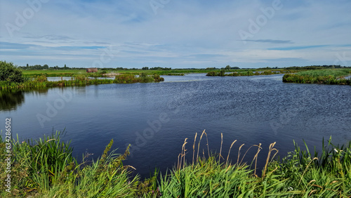Typical open wide lake district  of Dutch province Friesland, Netherland photo
