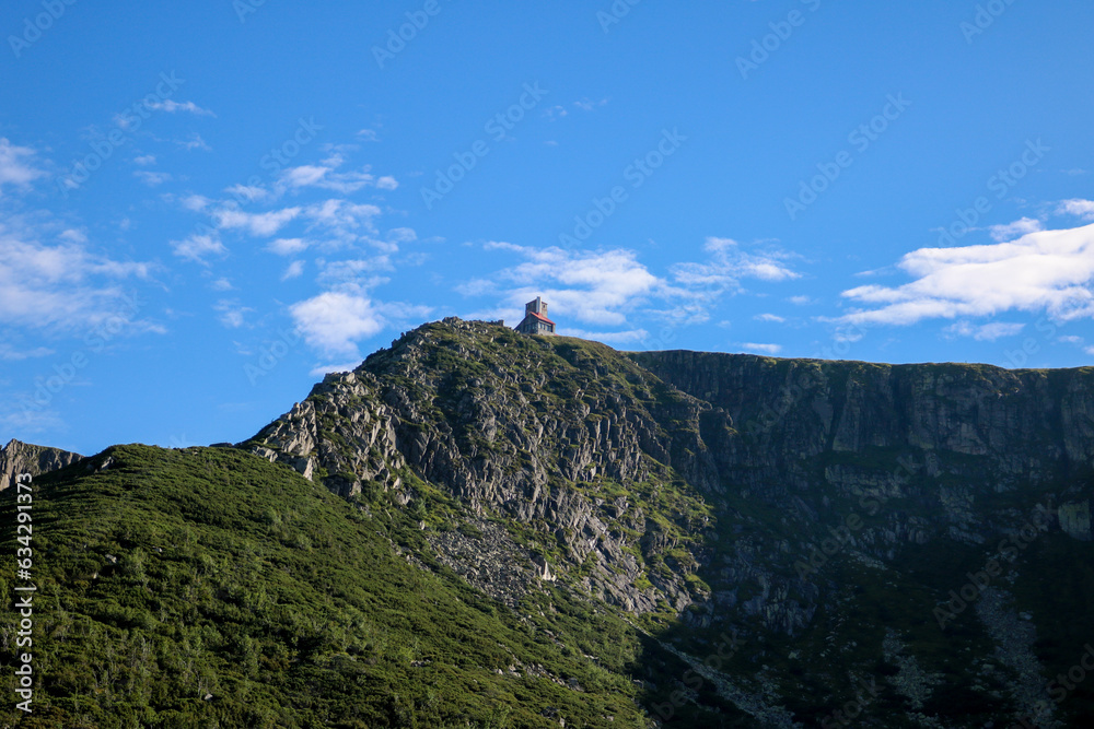 Naklejka premium mountain landscape with blue sky