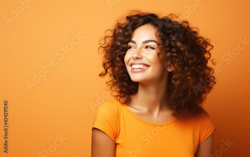 Happy ultra beauty girl, who is smiling and laughing, wearing bright clothes. Bright solid orange background. created by generative AI technology. © hakule
