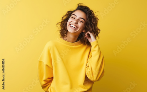 Happy young girl, who is smiling and laughing, wearing bright clothes. Bright solid background. created by generative AI technology.