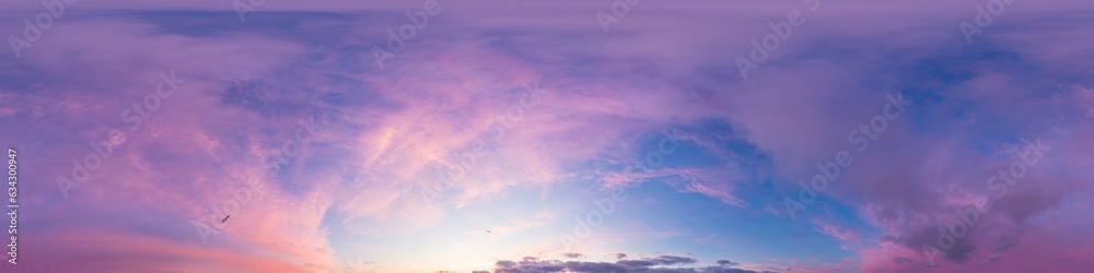 Bright sunset sky panorama with glowing red pink Cirrus clouds. HDR 360 seamless spherical panorama. Sky dome or zenith in 3D, sky replacement for aerial drone panoramas. Climate and weather change.