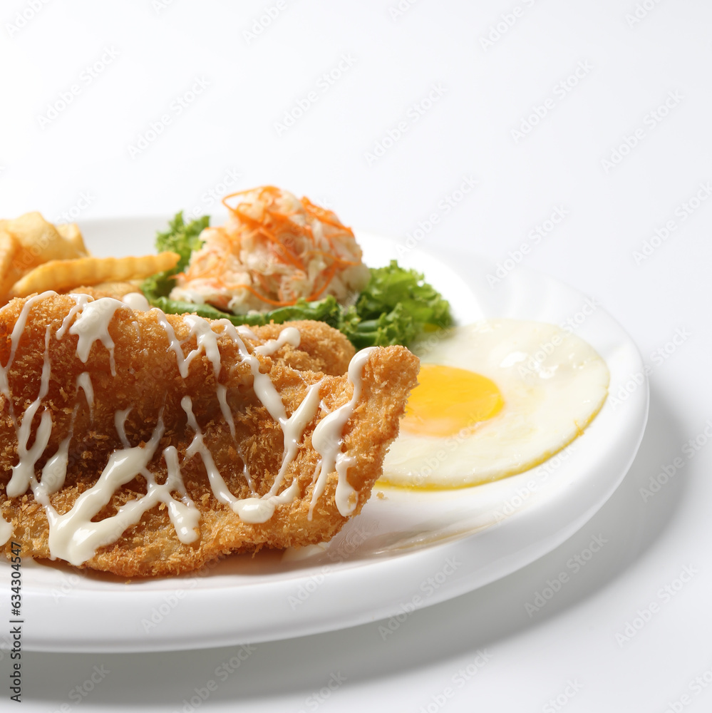 deep fried golden crispy fish fillet and chips with fried egg, French fries, coleslaw salad in tartar sauce on brown leather white background western chef halal food restaurant banquet menu cafe deep fried golden crispy fish fillet and chips with fried egg, French fries, coleslaw salad in tartar sauce on brown leather white background western chef halal food restaurant banquet menu cafe