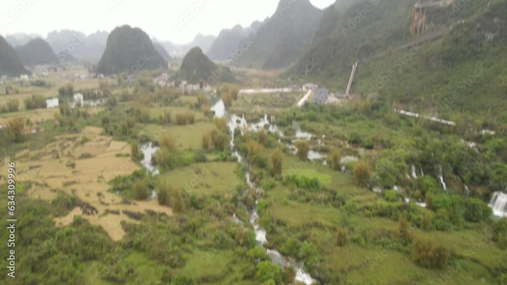 The aerial view of Ban Gioc Waterfall in Northern Vietnam The aerial view of Ban Gioc Waterfall in Northern Vietnam