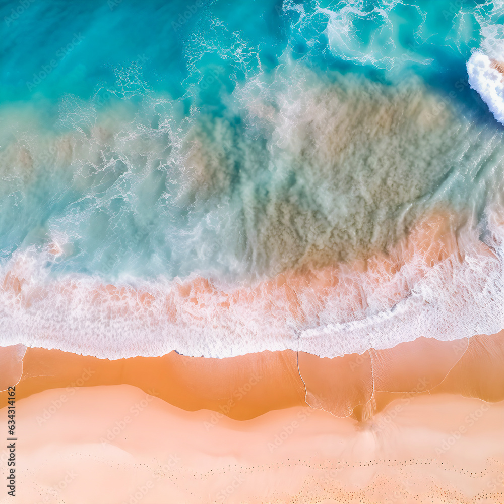 Aerial drone view of a desert beach with turquoise water.