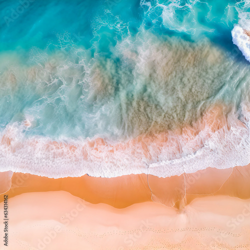 Aerial drone view of a desert beach with turquoise water.