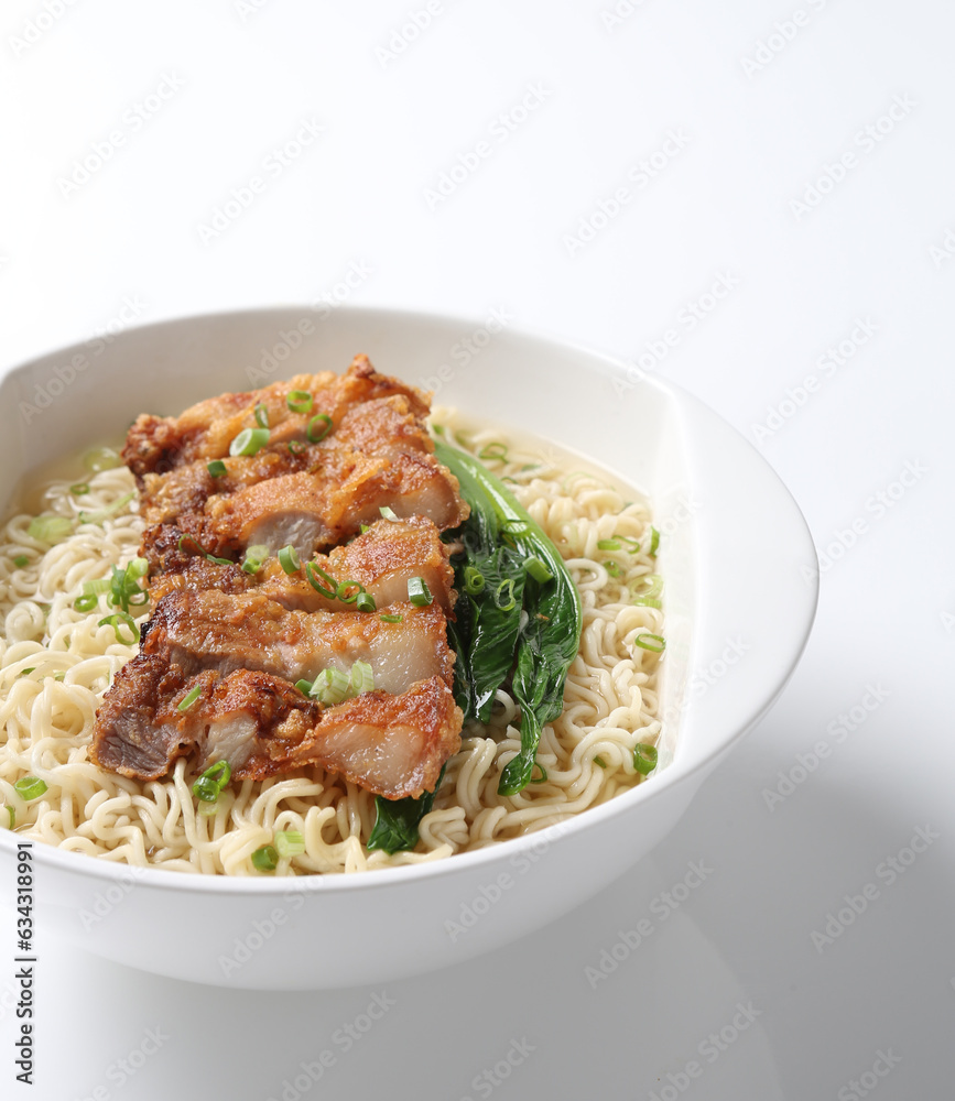 cook Japanese instant noodle mee soup with chicken chop cutlet and vegetables on bowl chopstick on white vintage newspaper background asian chef halal food restaurant banquet menu