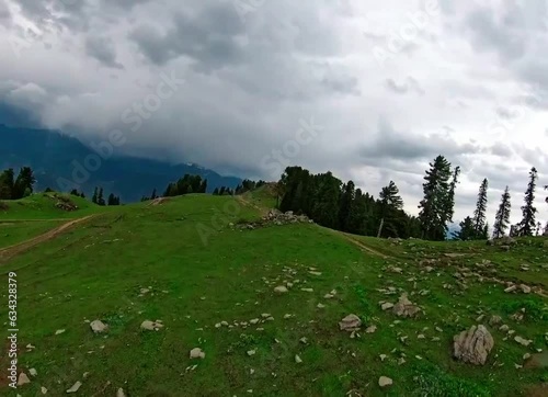 fast fpv drone shot of mountains and plains