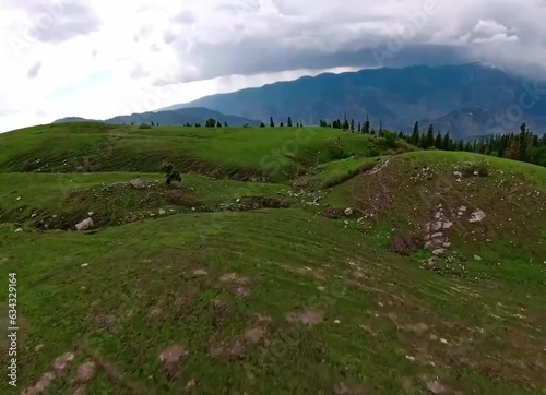 fpv drone footage of greenery in mountains landscape in the mountains