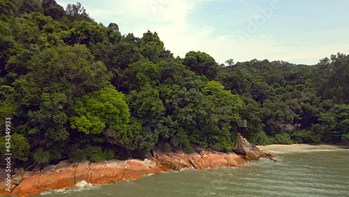 Aerial footage of Penang jungle, beach and sea - Malaysia