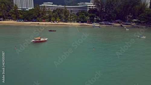 Aerial views of boats and beach off the coast of Penang Malaysia