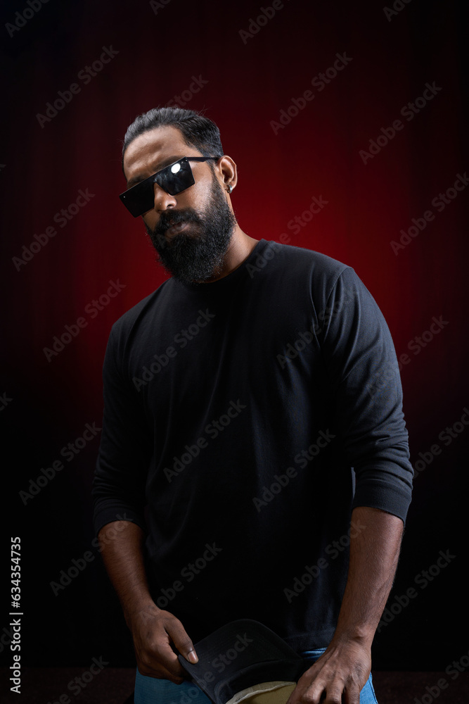 beard man with black t shirt and sunglasses