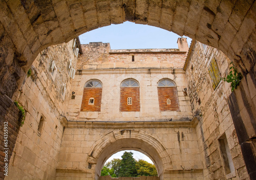 The 4th century Golden Gate in the historic city walls of Split in Croatia. Part of the Diocletian Palace. Also called Zlatna Vrata, Porta Aurea or Northern Gate photo