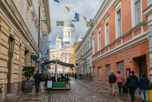 Streets of Helsinki. Finland architecture. Cathedral of St. Nicholas. Cityscape Helsinki. Tour to Finland. Street leads to Senate square. Excursion to cathedral St. Nicholas. Helsingin tuomiokirkko photo