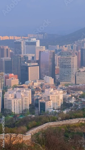 Aerial view of Seoul downtown cityscape and Namsan Seoul Tower on sunset from Inwang mountain. Seoul, South Korea. photo