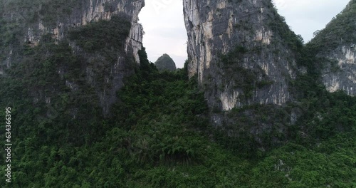 aerial shot over beautiful limestone karst mountain scenery, in Yangshuo County, China.Mountain landscape top view. 